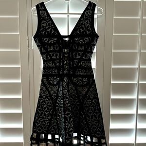 Trendy and sofisticares night out black and silver dress size S